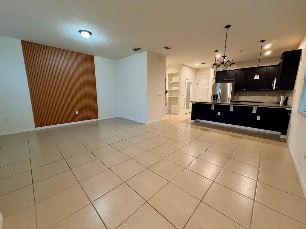 Photo of 2449 Varenna Loop, Kissimmee, FL 34741 (MLS # S5159136)