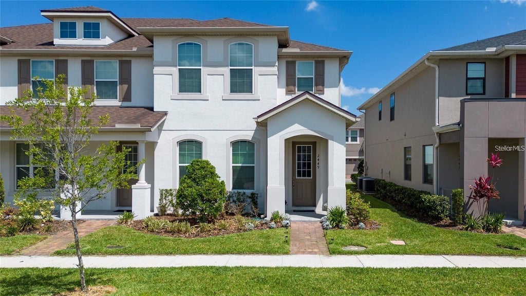 Photo of 2449 Varenna Loop, Kissimmee, FL 34741 (MLS # S5159136)