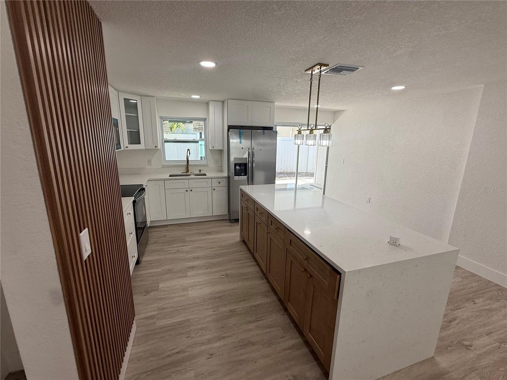 Photo of 2617 W Crenshaw Street, Tampa, FL 33614 (MLS # TB8563269)