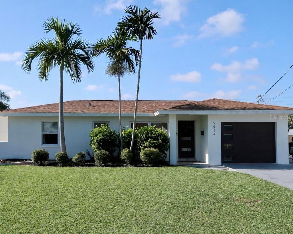 Photo of 9484 Treasure Lane NE, St Petersburg, FL 33702 (MLS # TB8486014)