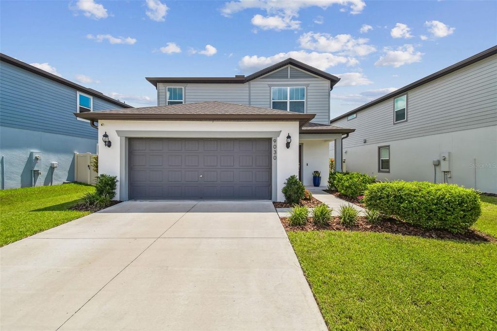 Photo of 9030 Rally Spring Loop, Wesley Chapel, FL 33545 (MLS # TB8414168)