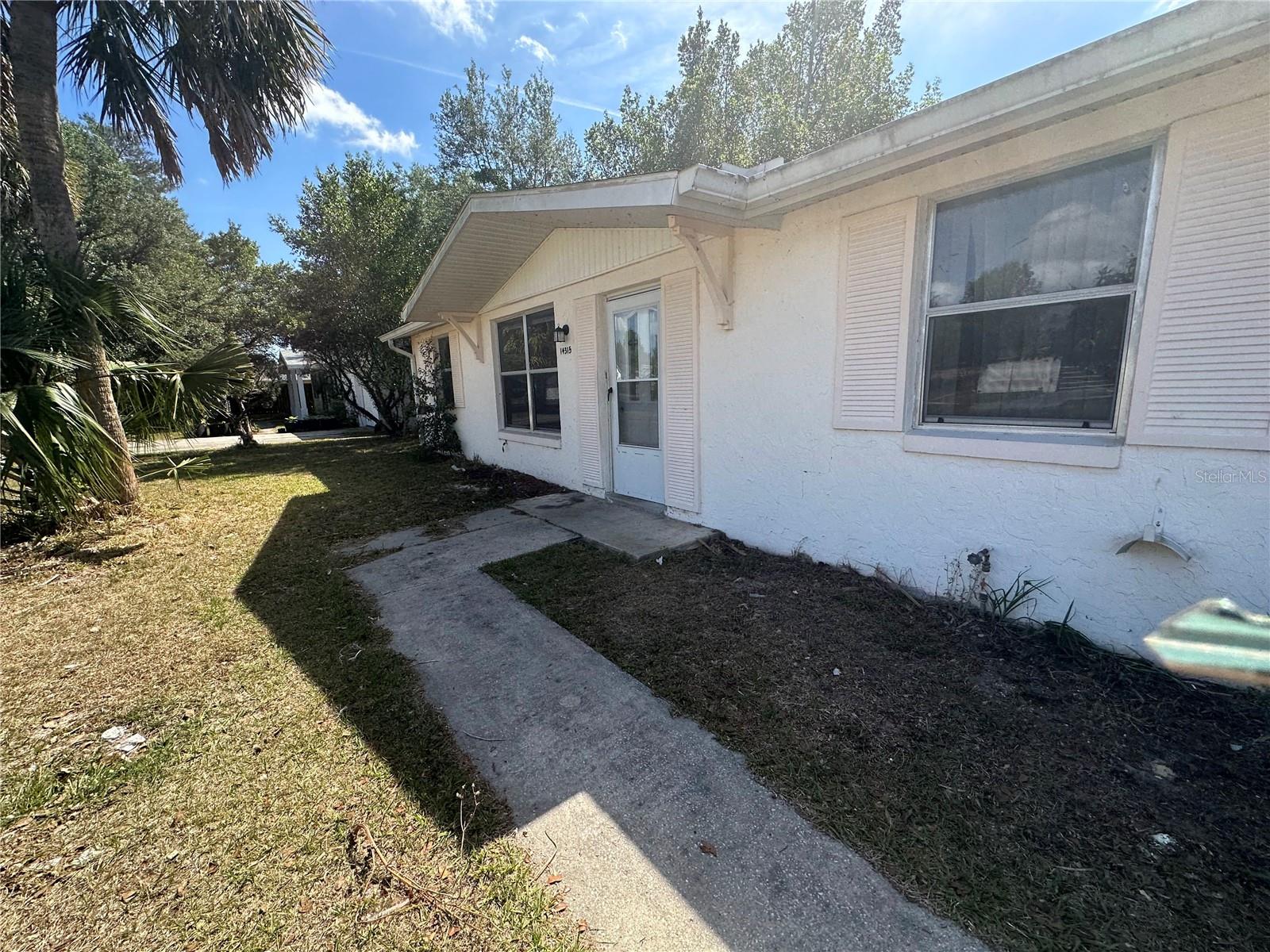 well-maintained 2-bedroom, 2-bath home in the heart of Marion Oaks. Offering approximately 1,190 square feet of living space, this property features an open layout with all-tile flooring for easy care and a fresh, clean look. The home includes a bright Florida room, central AC and heat, and efficient gas heating and water heater. The kitchen is equipped with a range and refrigerator, and home has a covered carport and storage. Situated near shops, restaurants, pharmacies, and local trails.