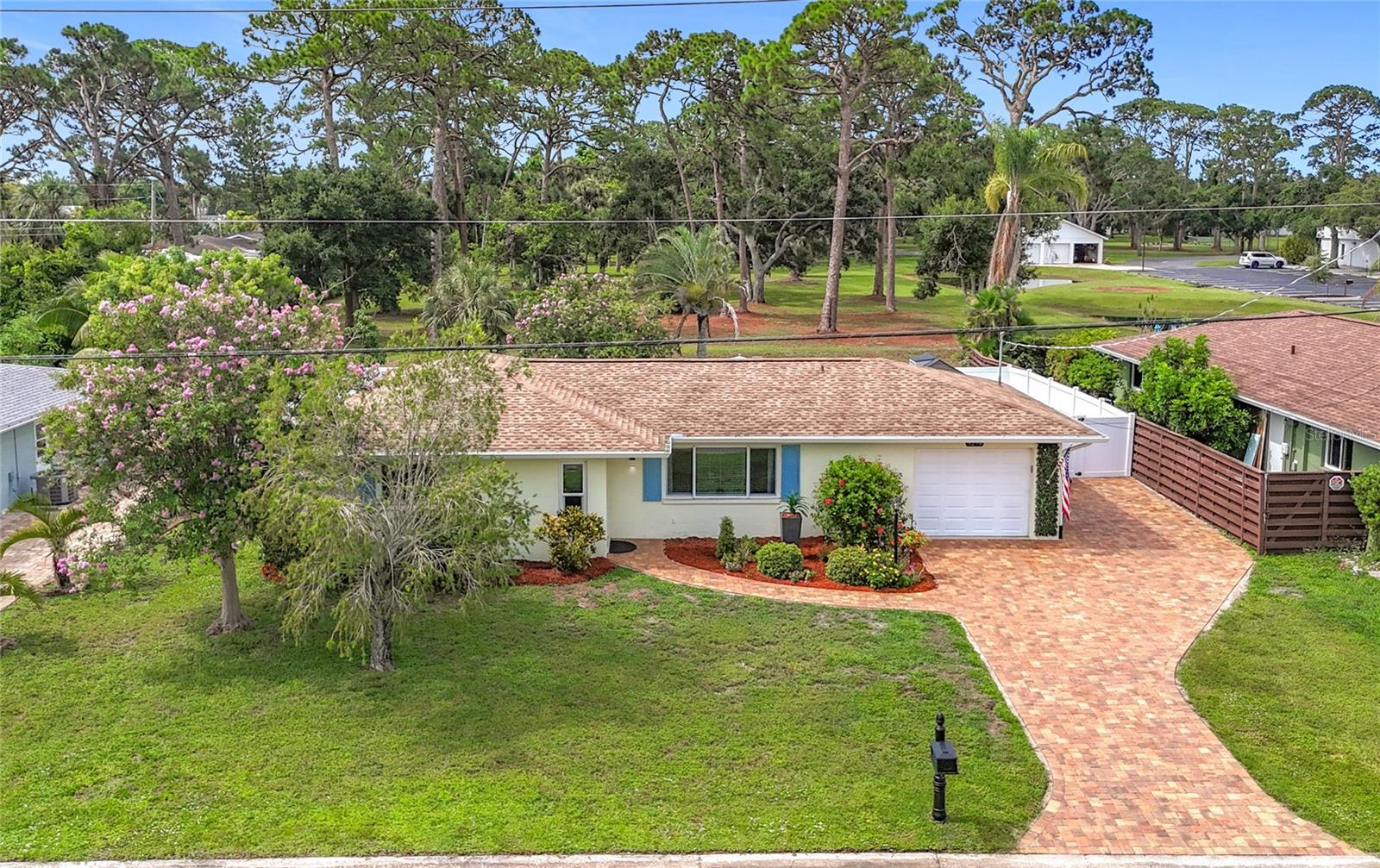 GULF GATE AREA - FULLY REMODELED - MINUTES TO SIESTA KEY - IMPACT WINDOWS, NEW ROOF - HIGH-END UPGRADES THROUGHOUT!
Welcome home to this impeccably updated 2-bedroom, 2-bath home in one of Sarasota Florida's most sought-after locations—just moments from world-famous Siesta Key Beach, Gulf Gate’s vibrant shopping & dining district, Gulf Gate Elementary, Gulf Gate Library, and much more! From top to bottom, this entire home has been transformed with thoughtful, high-quality upgrades designed for comfort, efficiency, and style. Major system updates include full IMPACT WINDOWS AND SLIDER, NEW ROOF (2024), NEWER AC (2022), new hot water tank (2024), a whole-house water filtration & softener system (2024), and a whole-home re-pipe — all providing peace of mind for years to come. Inside, you’ll love the new LVP flooring and tall baseboards that run throughout the entire home (no carpet here!), plus fresh interior paint and all-new light and plumbing fixtures. Both bathrooms have also been fully remodeled with modern vanities & countertops, stunning tile work, and glass shower doors. The showstopper kitchen is the heart of this home, featuring elegant Taj Mahal quartzite counters & continuous backsplash, crisp shaker cabinetry, and gold-tone hardware, sink, and faucet. The GE Café Series appliance package includes a sleek induction cooktop and convection/air-fry oven, plus a convection/air-fry microwave—blending function and flair in every detail. This versatile floor plan includes a rear bonus room 'flex space', ideal as a home office, den, or guest area, plus a 1-car garage with extra fridge, new lawnmower, bicycle, and grill—all included. PARTIAL FURNISHING ARE ALSO INCLUDED, making this home truly move-in ready. Enjoy Florida living year-round on your screened lanai, oversized paver patio, in your FULLY FENCED BACKYARD—perfect for pets and entertaining. Additional highlights include a large storage shed, lush landscaping with fresh mulch, and a paver driveway with extension for added parking. Best of all, the backyard offers privacy with no rear neighbors—just the peaceful wooded grounds of GGC. Ample room for a future swimming pool, if desired! This home offers the rare blend of modern living, an unbeatable location, and thoughtful upgrades—a true Sarasota gem! Don’t miss it!