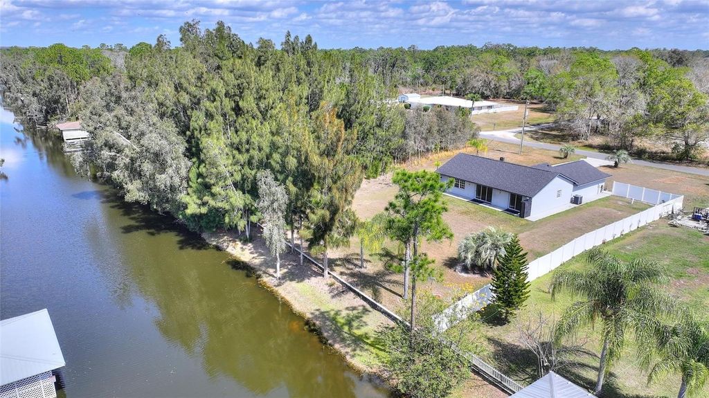 Photo of 6294 Arborea Drive, Indian Lake Estates, FL 33855 (MLS # P4938029)