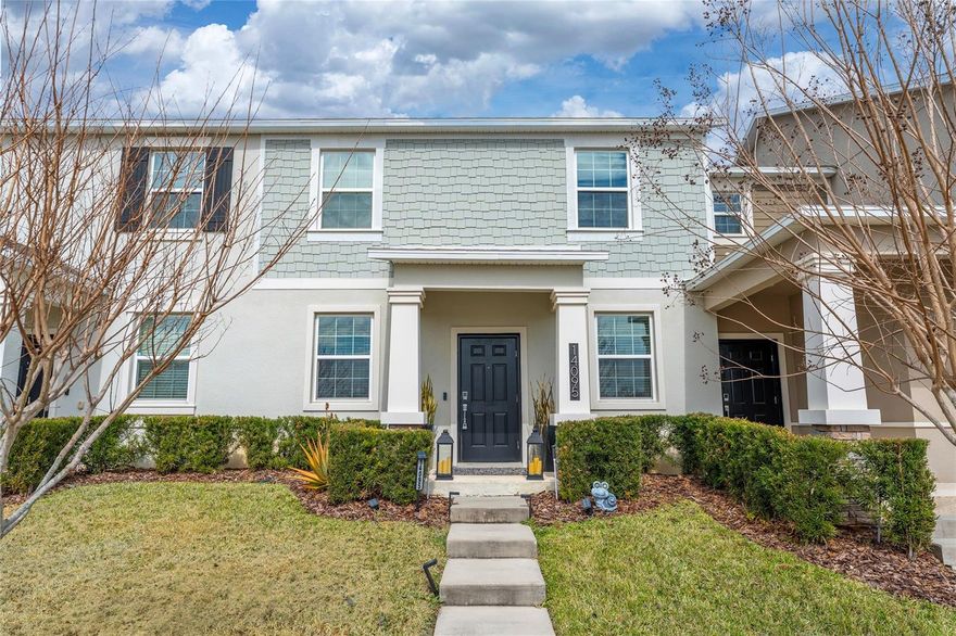 Impeccably maintained townhome in the highly desirable community of Storey Grove! Built in 2020, this beautifully cared-for 3-bedroom, 2.5-bath residence offers the perfect blend of style, comfort, and prime location. The open-concept first floor is designed for modern living and effortless entertaining, featuring tile flooring throughout the entire home, creating a clean, cohesive, and low-maintenance living environment. The spacious kitchen is a true highlight, offering abundant cabinetry, solid-surface countertops, stainless steel appliances, and a large center island that provides generous prep space and seating. The open layout allows the kitchen to flow seamlessly into the dining and living areas, making it ideal for gatherings and everyday living. Step outside to your privately fenced courtyard featuring a beautiful canopy, creating a shaded and inviting outdoor retreat perfect for relaxing or entertaining year-round. Upstairs, you’ll find three generous sized bedrooms and two full bathrooms. The primary suite includes a spacious walk-in closet and an elegant en-suite bath with dual vanities, offering both comfort and privacy. Ideally located just minutes from Walt Disney World, Disney Springs, Flamingo Crossings, major highways, shopping centers, restaurants, hospitals, and top-rated schools, this home delivers exceptional convenience in one of the most desirable areas near Orlando’s attractions. Whether you're searching for a primary residence or an investment opportunity, this property is must-see.