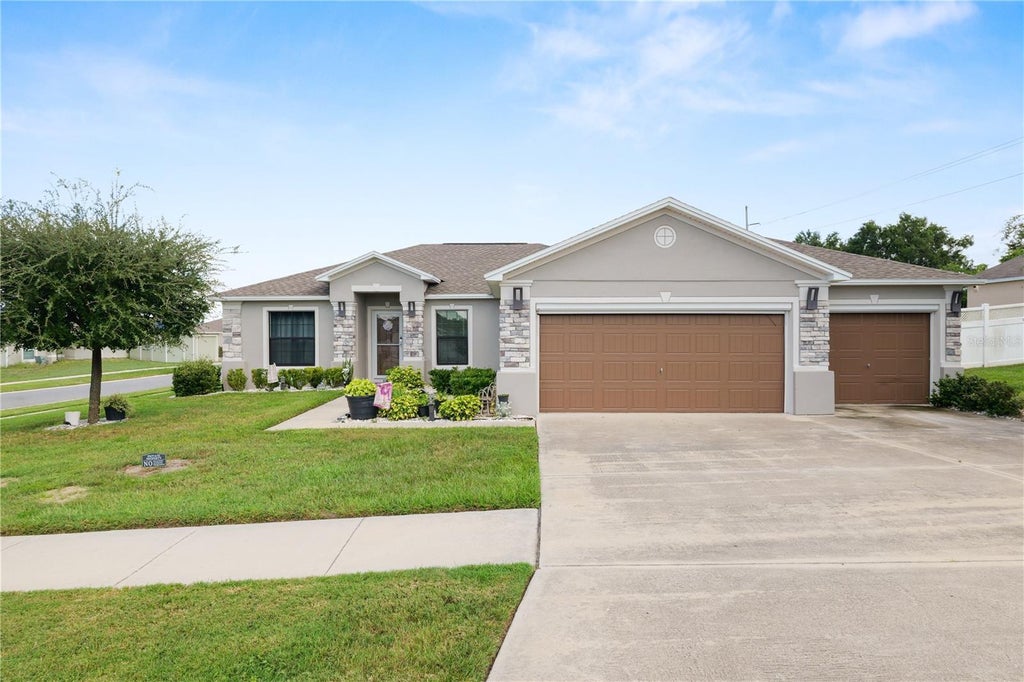 Photo of 215 Chicago Avenue W, Haines City, FL 33844 (MLS # L4965113)