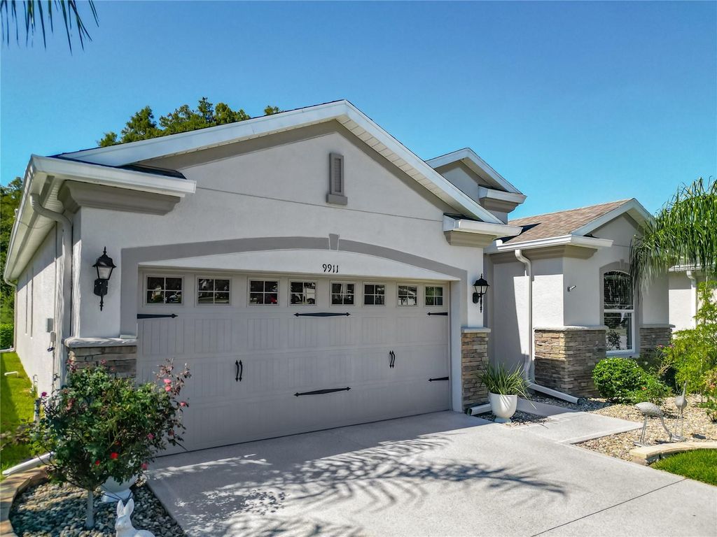 Photo of 9911 Saunton Drive, San Antonio, FL 33576 (MLS # TB8437436)