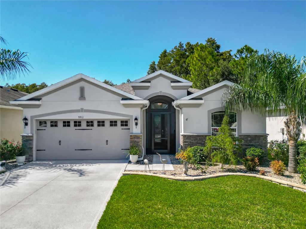 Photo of 9911 Saunton Drive, San Antonio, FL 33576 (MLS # TB8437436)