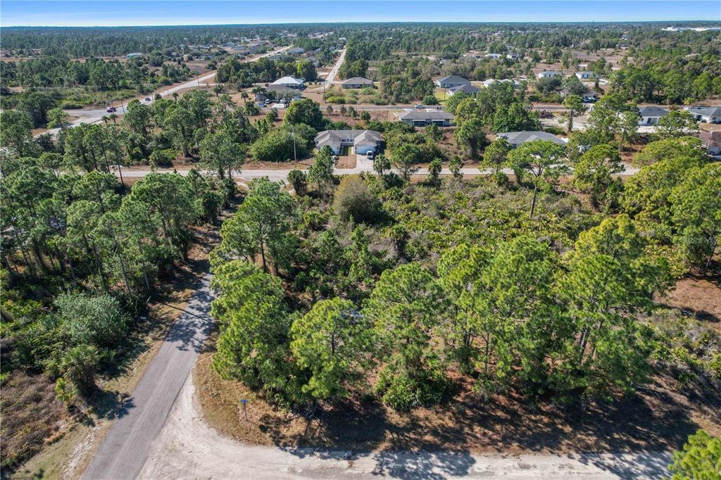 Photo of 774 Kirkman Avenue, Lehigh Acres, FL 33974 (MLS # O6380323)