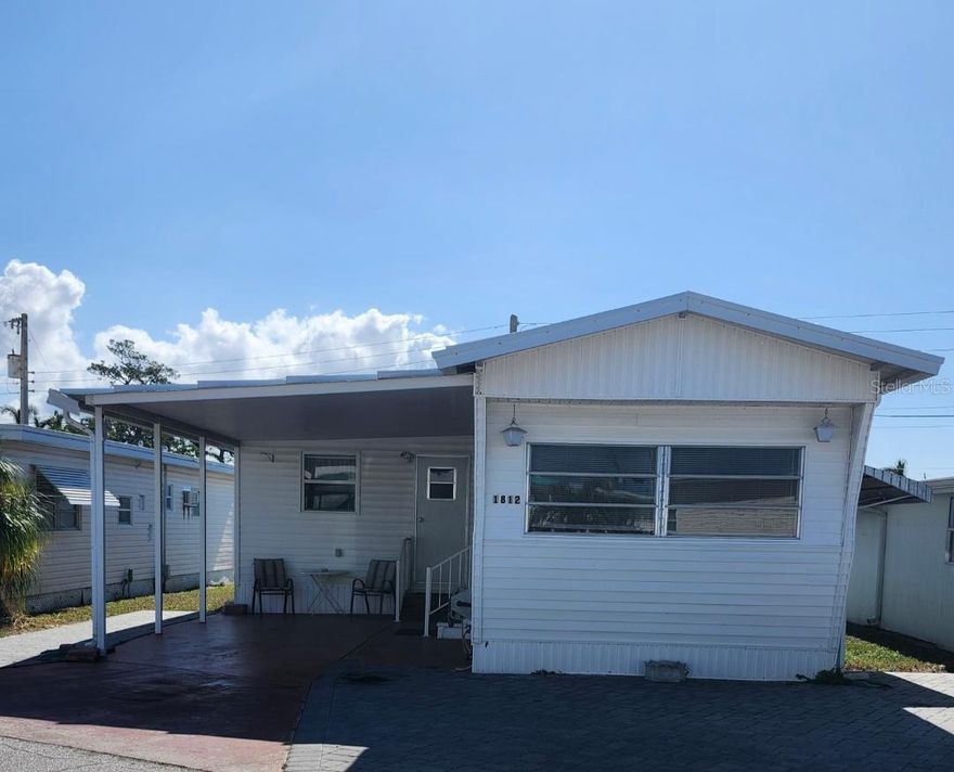 Move right in to your bungalow in Paradise! Still has a lot of vintage charm, but ready for your updates, if you choose, to this 2 Bedroom, 2 Bath Mobile Home in the highly desired, active 55+ Trailer Estates community. Location! Just steps from the heart of the social scene to the community pool, recreation buildings, shuffleboard, post office, fitness center and wood shop. You don't have to drive anywhere to access all the wonderful park amenities. Tons of storage. Newer AC. Inside Laundry in second bath. 11'x9' Storage shed. You own the land. Boaters have direct access to Sarasota Bay from the Marina. Enjoy the large, heated community pool, hot tub, gym and wood shop. The community buzzes with pickleball, shuffleboard, kayaking, horseshoes, bocce, dancing and more. A US Post Office on site. 10 minutes to the SRQ Airport. Convenient to shopping, restaurants, the Arts and everything in/around Bradenton/Sarasota. Sold furnished.