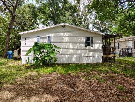 Secluded Retreat – Updated 3/2 Mobile Home with Total Privacy!
Welcome to your private oasis! Nestled on a quiet, secluded street, this beautifully updated 3-bedroom, 2-bathroom mobile home offers the perfect blend of comfort and tranquility. Recent updates include a new roof and heat/air system in 2021,Septic and engineer inspected 2024 giving you peace of mind and energy efficiency for years to come.
Inside, you'll find a bright and inviting layout with stylish finishes and a thoughtfully refreshed interior. Step outside and enjoy your mornings surrounded by mature trees—no neighbors in sight, just you and nature.
Despite its peaceful setting, you're just minutes from major highways, shopping, dining, and entertainment. Plus, enjoy easy access to both Tampa and Orlando, making day trips and weekend getaways a breeze.
Whether you're looking for a full-time residence or a serene seasonal escape, this hidden gem delivers the privacy you crave and the upgrades you need.