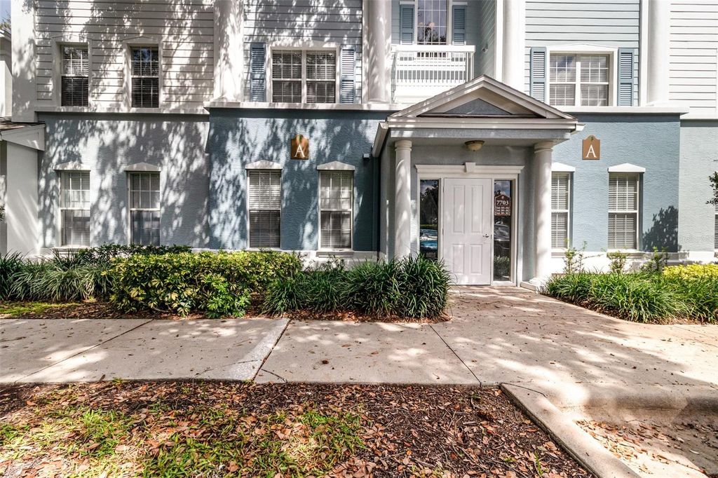 Photo of 7703 Heritage Crossing Way #102, Reunion, FL 34747 (MLS # O6344297)