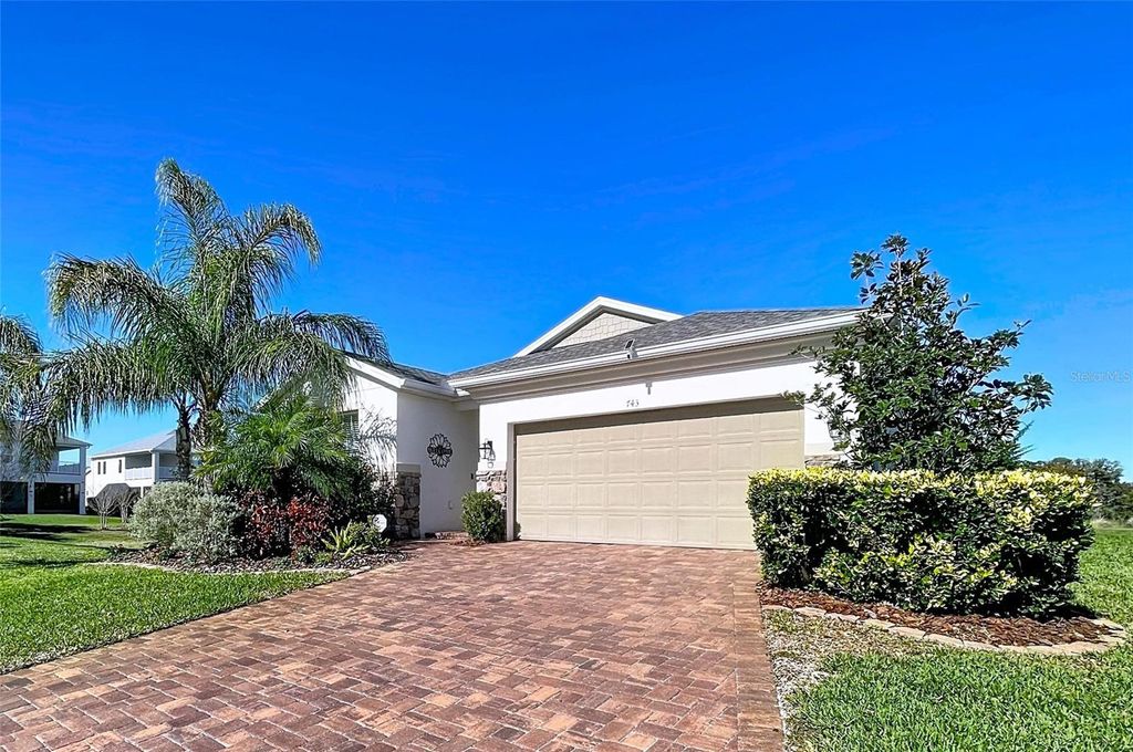 Photo of 743 Cajeput Loop, Tarpon Springs, FL 34689 (MLS # W7881849)