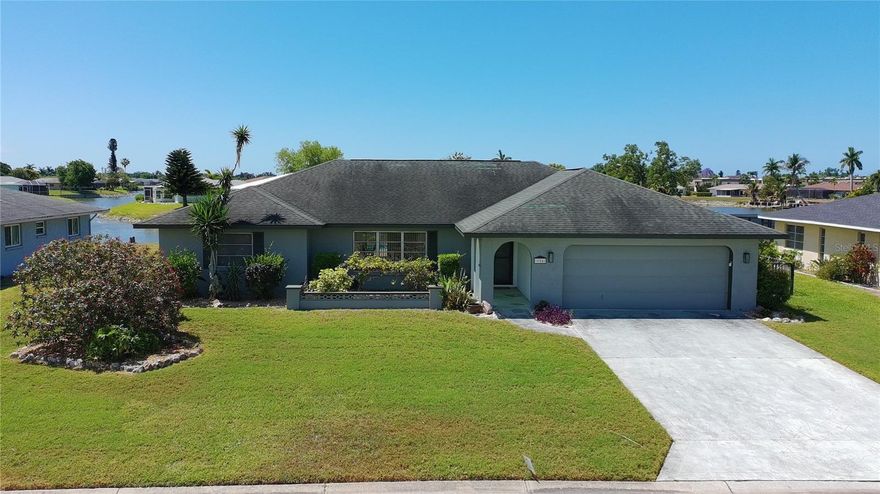 Come home to this light, bright, cozy split level modern designed home, overlooking a true Floridian scape of Claw Lake and its natural setting in your back yard. 
This home features fresh appointments of lighting and fresh paint throughout the home inside and out. The kitchen displays light cabinets, granite counter tops and laminate wood floors throughout. 
The bedrooms are equipped with large walk in closets with quick access to bathrooms. Nice size laundry room attached to garage with good size storage closets.  There is a breakfast nook in addition to a formal
dining room. There are great open spaces for family gatherings spilling over into the extended lanai and pool. Just past the pool cage sits a solid dock  for enjoyment of more 
leisure activity at the waters edge. This location is very close by to schools, shopping, YMCA, beaches and downtown Venice. This property has amazing value and affordability for 
any stage of life. It wont be available for very long. Come and see it for yourself!