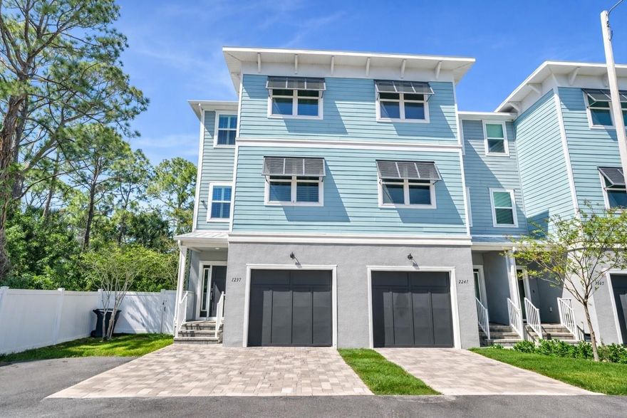 Welcome to Riviera Place Townhomes, where elevated design meets an unbeatable Tampa–St. Petersburg lifestyle. This exceptional 4 bedroom, 3 full bath luxury townhome is ideally positioned just moments from the bay, Gulf beaches, The Getaway, and scenic waterfront bike paths offering effortless access to the very best of both cities.
From the moment you enter, the home impresses with thoughtful architecture and refined upgrades throughout. The oversized tandem garage is a true standout, offering the flexibility to accommodate a boat and two cars or up to four cars. Complete with a mounted basketball hoop and oversized ceiling fan, this space is as functional as it is unique. Outdoor living is equally compelling, with a fully fenced backyard and extended brick paver patio an uncommon feature within the community perfect for entertaining or enjoying private, relaxed Florida living.
Inside, modern sophistication is evident at every turn. The home is enhanced with LED recessed lighting,WiFi enabled keyless entry, hurricane impact windows and sliders, and ceiling fans throughout, delivering both comfort and peace of mind.
The gourmet kitchen is designed to impress, featuring upgraded quartz countertops, an expansive island, designer pull-down faucet, pop-up outlets, a built-in workspace, and a spacious walk-in pantry with custom barn doors, all complemented by premium stainless steel appliances.
The second level offers an inviting, light-filled living space that opens to a private paver balcony, along with a bedroom and full bath ideal for guests or a home office. The top floor is anchored by a luxurious primary suite, complete with an extended walk-in closet, oversized walk-in shower, dual vanities, and elevated finishes. An additional bedroom and full bathroom complete this well-designed layout.
Additional upgrades include upgraded flooring throughout (no carpet), custom blinds, and rare triple parking spaces, making this residence one of the most upgraded homes in the community.
Riviera Place offers a private gated entrance, resort-style pool and clubhouse, scenic pond, guest parking, and dog park. Ideally located less than 15 minutes to Downtown Tampa and Downtown St. Petersburg, with convenient access to MacDill Air Force Base, Tampa International Airport, I 275, and the Crosstown Expressway.
This is a rare opportunity to own a refined, move-in-ready residence that seamlessly blends luxury, functionality, and location.