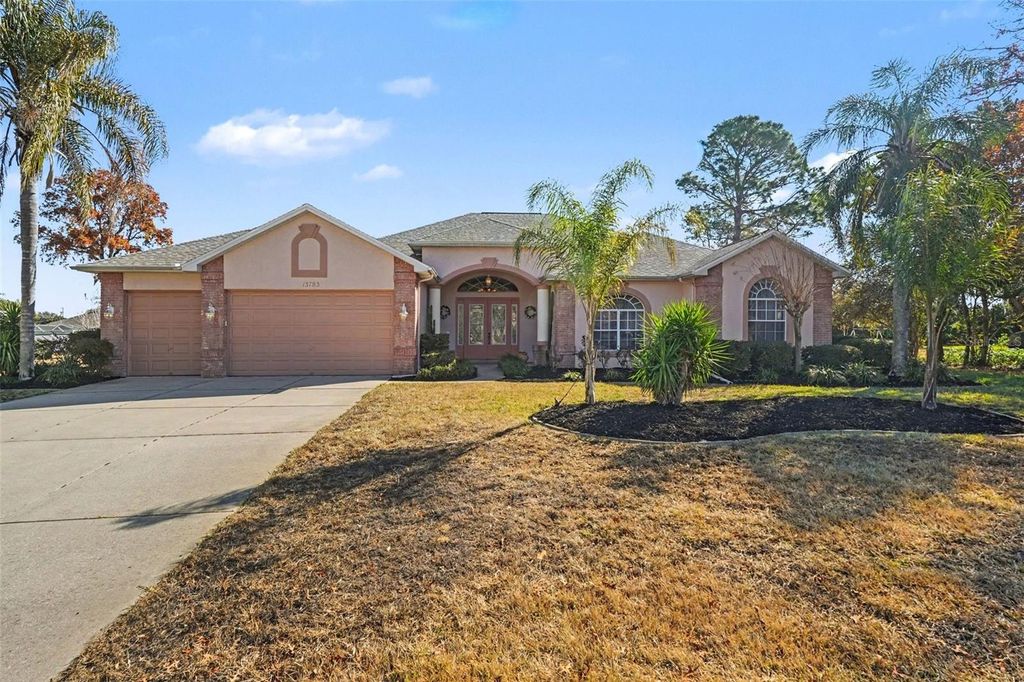 Photo of 13783 Rudi Loop, Spring Hill, FL 34609 (MLS # TB8474689)