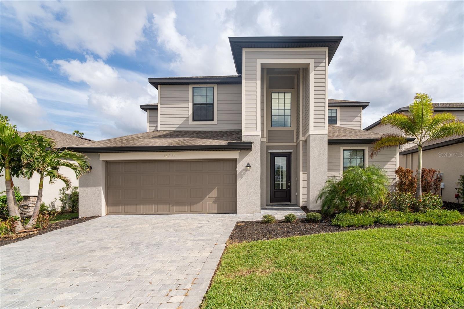 $20,000 PRICE IMPROVEMENT..WOW! Some photos have been staged. This LENNAR BUILT home in 2022 is VACANT, MOVE IN READY, and in the deed restricted community of "TORTUGA", one of WELLEN PARK'S intimate GATED communities! This beautifully Lennar built, SMART home, was completed 5/2022, and is just waiting for you to call it your treasured home! If you don't want to wait for a new home to be built AND experience the possible unexpected construction delays AND multiple price increases in materials and supplies during construction, then this sizable, open and airy home is ideal for you! This PERFECTLY DESIGNED 3,231 sq. ft., 2 STORY HOME features 5 SPACIOUS BEDROOMS and 3 FULL BATHROOMS, PLUS A 2ND FLOOR 13' x 18' BONUS ROOM for your office, game room or that long awaited media room. The chef in your family will just love the stainless-steel appliances, granite countertops, an abundance of wood cabinets in the generous kitchen, and cozy breakfast nook that opens to a spacious great room. Just off the kitchen is a SEPARATE DINING ROOM that will accommodate you and your more formal style of entertaining. A SEPARATE LIVING ROOM, adjacent to the dining room, is the perfect place to serve your dinner guests dessert. Near the interior laundry room, is a very large closet under the staircase that can accommodate storage of holiday decorations, vacuum, luggage, just about anything you don't need on a daily basis...it is huge! The first floor also includes one bedroom (with new flooring), one full bathroom, the laundry room and a 3-CAR TANDEM GARAGE. The second floor has 4 bedrooms, a large bonus room and 2 full bathrooms. The master bedroom boasts 2 walk-in closets. The en-suite bathroom has dual sinks, large glass enclosed shower, separate large oval tub, new flooring, and separate water closet. THE 3 CAR TANDEM GARAGE, will surely accommodate all the drivers in your family, as well as those needed Florida toys for water fun, etc. This SMART home has a RING Video doorbell system, brick paver driveway, entryway and lanai. The community of Tortuga has an area park and playground for its residents to use, which is just a short distance from this home. The HOA Fee includes a maintenance free, gated community, lawn mowing, edging, fertilization, water for irrigation, cable TV and internet! The community of Tortuga, made up of single-family residences, is WITHIN MINUTES OF THE NEW WELLEN PARK and all the fabulous amenities it has to offer, AS WELL AS THE NEW COSTCO! All that Venice has to offer and all that you could possibly want in the form of shopping, entertainment, dining, beaches, fishing, golf, the interstate, CoolToday Park: which is the spring training home of the Atlanta Braves of Major League Baseball, and more, is just a short driving distance away! How could you want to live anywhere else? Schedule your showing today of this SPACIOUS, BEAUTIFULLY BUILT AND MOVE-IN READY home!