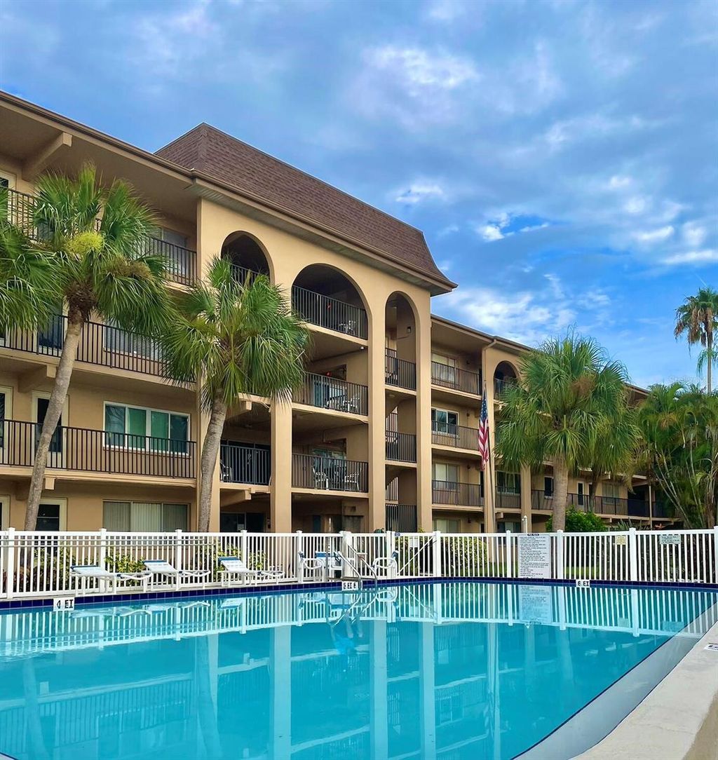 Photo of 2525 W Bay Drive #C34, Largo, FL 33770 (MLS # O6408808)