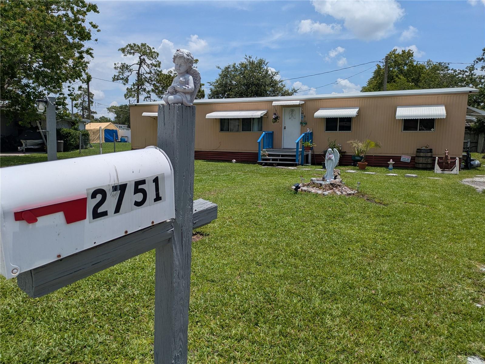 LOCATION... in the heart of Kissimmee and Orlando limit. A Manufactured Home with 3 large bedrooms and 2 full bathrooms, over 1600 sq. ft. Features include a formal dinning room area with built in cabinetries , next to a formal living room. An eat-in kitchen/breakfast area next to the kitchen and back porch access.Major roads and easy access to stores and attraction parks. NO HOA, great and quiet neighborhood.