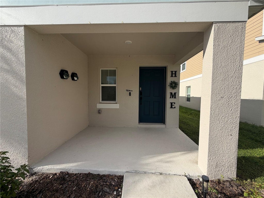 Photo of 1563 Ellesmere Avenue, Haines City, FL 33844 (MLS # O6443685)