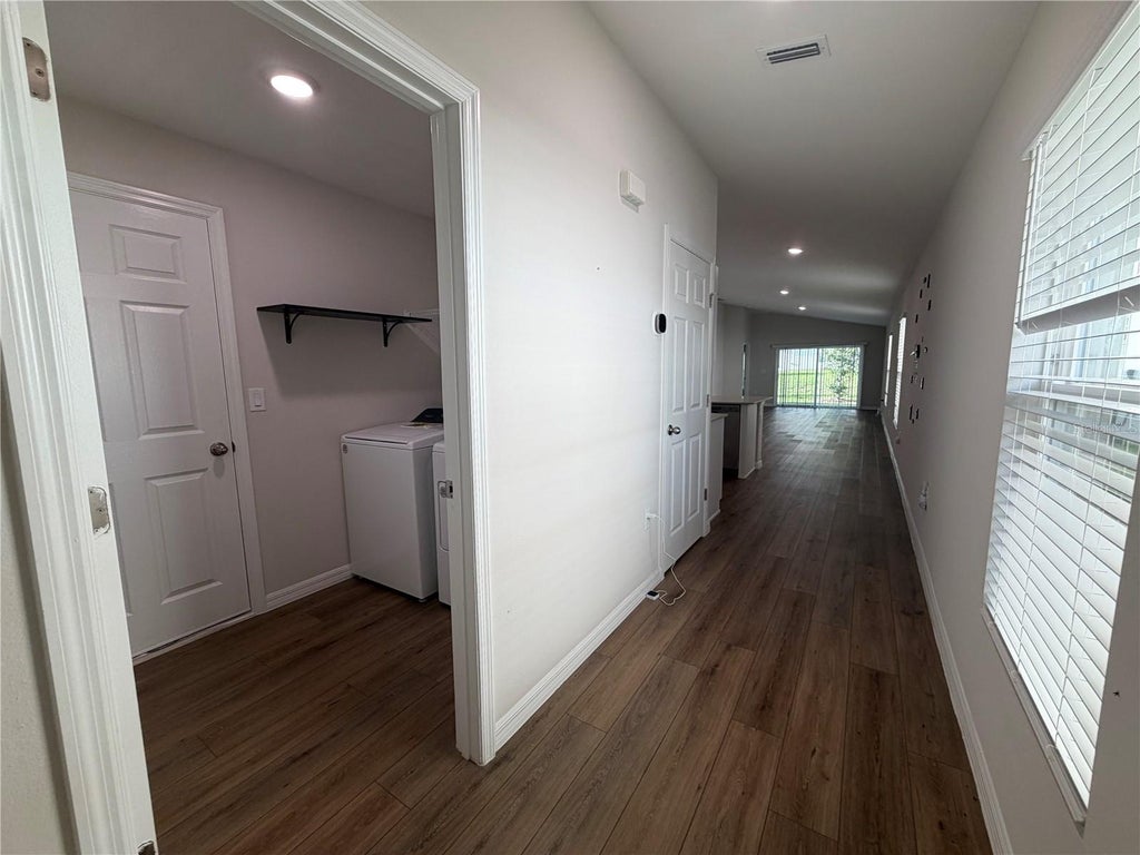 Photo of 1563 Ellesmere Avenue, Haines City, FL 33844 (MLS # O6443685)