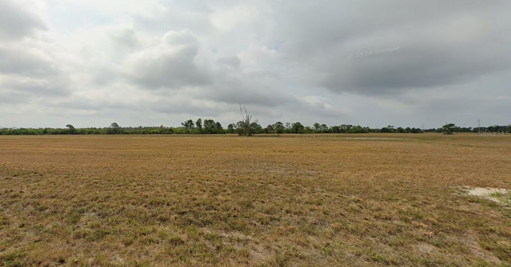 Photo of 12252 Tripletail Drive, Placida, FL 33946 (MLS # C7521556)