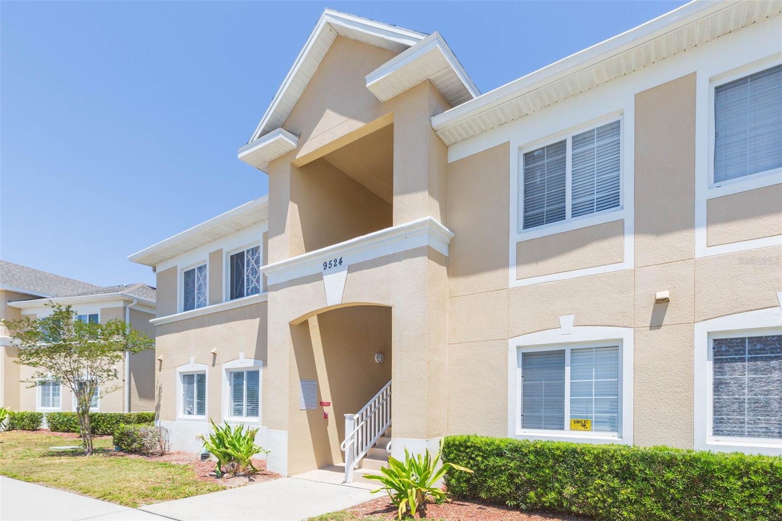 Welcome home to this beautifully updated first-floor condo located in the desirable Villages of Bloomingdale, a gated community in the heart of Riverview. This spacious 3-bedroom, 2-bathroom unit offers comfort, style, and convenience with an ideal split floor plan and modern finishes throughout. Step into the updated kitchen, featuring stainless steel appliances, wood cabinetry, granite countertops, and barstool seating, perfect for casual dining or entertaining. The open-concept living and dining area is generously sized, with sliding glass doors that lead to a screened-in, covered patio offering peaceful wooded views and no rear neighbors — your private retreat after a long day. The primary suite includes a large walk-in closet and a private en suite bath with a shower/tub combo. Two additional bedrooms are located on the opposite side of the unit, providing added privacy, along with a second full bathroom. A stackable washer and dryer is conveniently located in the unit for easy laundry. Enjoy resort-style living in a well-maintained community with amenities that include a pool, playground, and clubhouse. Monthly fees include water, sewer and trash. Located just minutes from Highway 301 and I-75, this home offers quick access to shopping, dining, supermarkets, and all the best of Tampa Bay — including parks, golf courses, and the world-famous Clearwater Beach. Whether you're a first-time homebuyer, downsizing, or investing, this move-in ready condo checks all the boxes! Schedule your showing today and come see why the Villages of Bloomingdale is one of Riverview’s most sought-after communities!