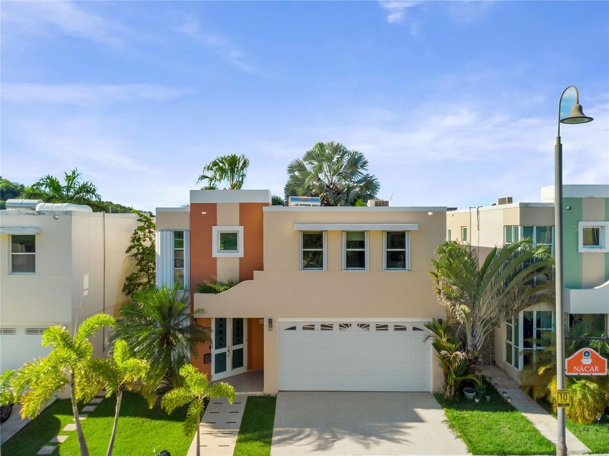 Beautiful 2-story home located in the prestigious gated community of Mirabella Village & Club in Bayamón. Features 4 bedrooms, 3.5 bathrooms, double carport, hurricane shutters, ceramic tile floors, and mini split A/C units throughout. Community offers resort style amenities including pool, tennis court, basketball court, gym, and 24/7 security. Conveniently located near highways PR-22 and PR-5, shopping centers, hospitals, and restaurants. HOA fee: $232/month. Don’t miss this opportunity!
