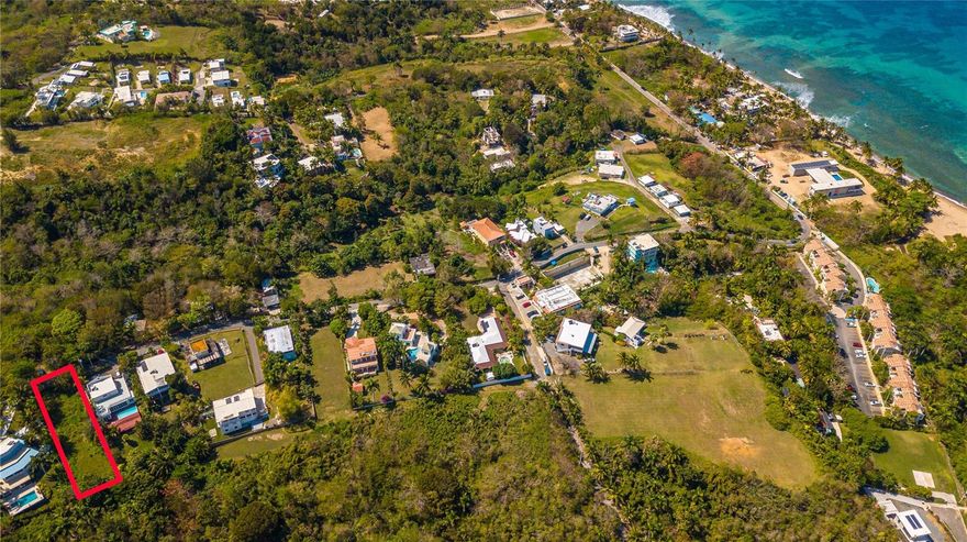 Very large, gently sloped rectangular lot, just a short walk from the beach and world class surfing with ocean views!! Located in the Rincon neighborhood of Puntas, known for its great beaches and surfing, this lot sits between two very nice homes with plenty of room to build and have a large yard and/or pool. Coordinates: 18.3671921, -67.2512798