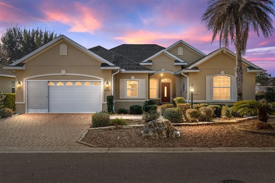 Welcome to Candler Hills in On Top of the World — where resort-style living meets everyday comfort! This beautifully maintained Huntley II floor plan offers over 2,600 square feet of living space with a desirable split-bedroom design and thoughtful upgrades throughout. The home is freshly painted, has crown molding and laminate flooring, and features a spacious layout ideal for both entertaining and relaxing. The kitchen boasts granite countertops, stainless steel appliances including a gas range, and abundant cabinetry for excellent storage. The primary suite is a true retreat with a tray ceiling, an exceptionally large walk-in closet, and a well-appointed bath featuring dual sinks, a dressing vanity, and a tub/shower combination. The third bedroom,14x20 (no closet) can be used as a bonus room and offers flexibility for a guest room, hobby space, or home office. Enjoy gatherings in the generous living and dining areas, or relax in the enclosed, air-conditioned porch with glass windows, perfect for year-round enjoyment. Additional highlights include an indoor laundry room with washer, dryer, and utility sink, a garage with Mitsubishi A/C unit, paver driveway and front entry, and low-maintenance landscaping with decorative rock borders.  Major updates include a NEW ROOF (2025), NEW 4-ton HVAC (2022), and new attic insulation for energy efficiency.  Residents enjoy full access to The Lodge at Candler Hills, offering resort-style amenities including pools, and state-of-the-art fitness center, golf, pickleball, and countless social activities. Conveniently located near shopping, dining, and medical facilities.  Immediate occupancy available — the seller has already moved!