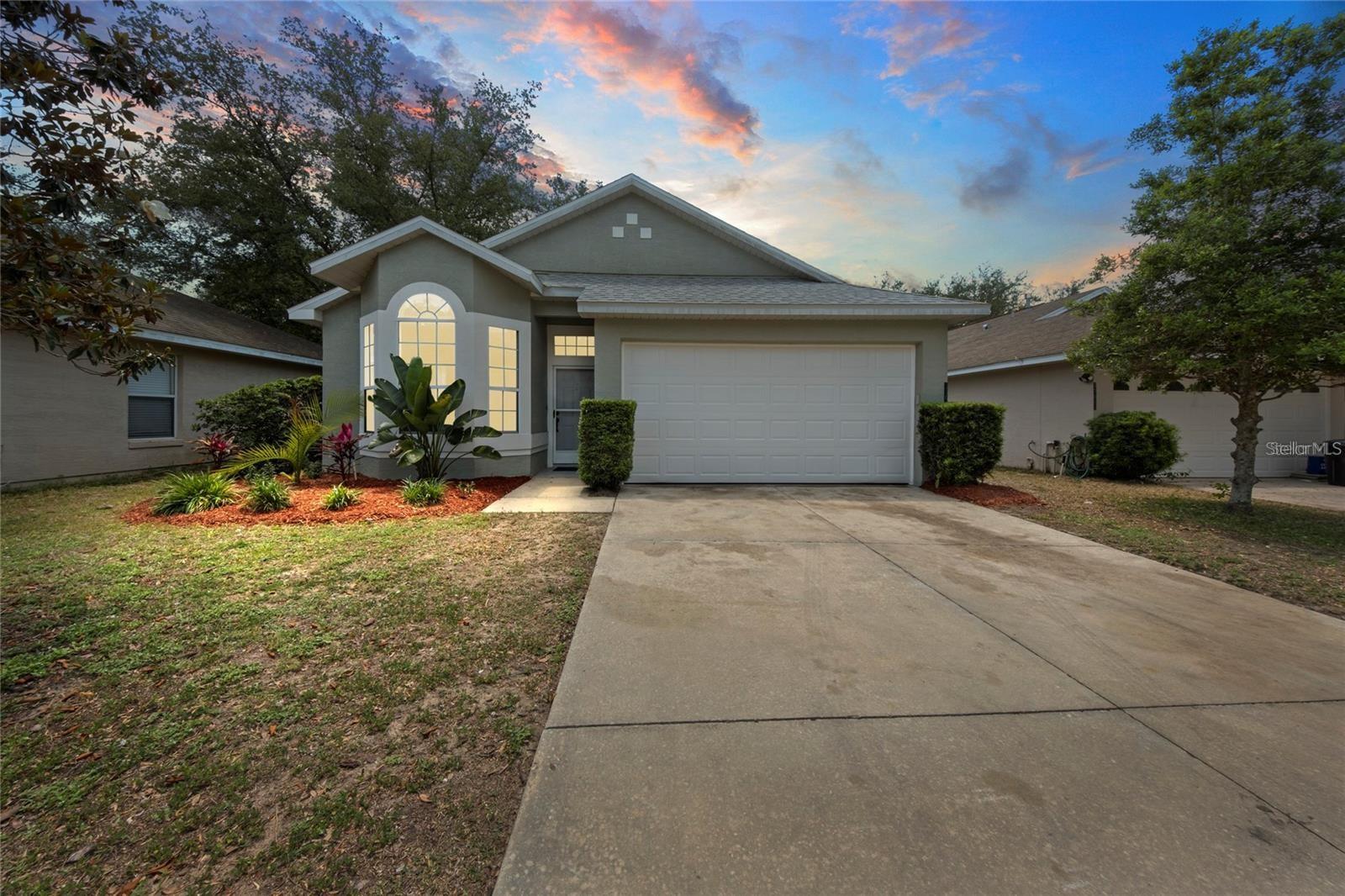 Owner financing available. 3 bedroom, 2 bath home nestled in a peaceful cul-de-sac in the esteemed Stonegate at Silver Lake Subdivision in Leesburg, Florida. This charming home offers an idyllic retreat from the hustle and bustle of city life. Boasting three bedrooms and two bathrooms, this home epitomizes modern suburban living at its finest. As you step through the inviting threshold, you are greeted by a spacious living area that is bathed in natural light, creating a welcoming ambiance for relaxation and entertaining alike. The heart of the home, the kitchen, is a chef's delight, featuring luxurious Corian countertops that provide both durability and style. The sleek surfaces are beautifully accented by new stainless steel appliances. Ample cabinet space ensures plenty of room for storage, while the adjacent breakfast nook provides a cozy spot to enjoy your morning coffee or a casual meal. The ensuite bathroom boasts a glass enclosed separate shower, providing the ultimate in convenience. Two additional bedrooms are separate from the primary, ideal for accommodating family, guests, or a home office. A second full bathroom ensures ample space and privacy for all. Whether you're hosting a barbecue with friends or simply enjoying a quiet evening under the stars and under the trees in this outdoor oasis it is sure to impress. Located in the highly sought-after Stonegate at Silver Lake Subdivision, residents enjoy access to a host of amenities, including a community pool and park with playground. With its prime location near shopping, dining, and entertainment options, as well as easy access to major highways, this home offers the perfect blend of convenience to many things. First-time homeowners dream home. Roof 2021, water heater 2021, new garage door 2023, new carpet 2023, new appliances 2024.