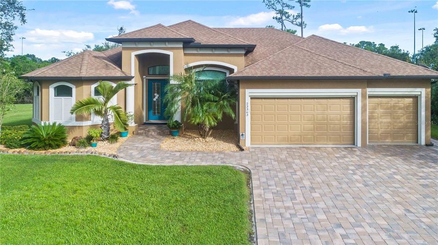 You will feel that you have stepped into a model home when you enter!
From the voluminous double tray ceilings to the zero corner sliding
glass doors, you will immediately appreciate the extra features that add
to the spaciousness of this popular open floorplan with plantation
shutters throughout. Nature is literally right out back with ¾ acres
consisting of 289’ of waterfrontage, offering abundant views and
privacy from the expansive outdoor areas. The kitchen showcases dark
solid wood cabinetry with granite countertops, using a stacked stone
backsplash for the perfect accent. A gorgeous decorative farmhouse
sink, upgraded black stainless appliances, cabinet pantry with pull outs,
an electric cooktop, and a convection wall oven/microwave
combination accompanies the expansive granite island, supplying ample
space for cooking and entertaining. The large master bedroom with ensuite bath features a linen and two walk-in closets, large double entry
walk-in shower with luxurious rainfall showerhead in addition to the
handheld sprayer, separate water-closet, plus a gorgeous bowl sink and
separate vanity, completing this private oasis. The two additional
bedrooms and guest/pool bath on the opposite side of the home can be
completely closed off by the pocket door to ensure privacy when
needed. Maintenance will be a breeze with only engineered wood and
tile flooring throughout. All windows and sliders are Impact Resistant,
providing plenty of natural light and safety. Even the outdoor area will
exceed your expectations, with the sealed brick pavers, granite topped
wet bar, mini fridge, stereo receiver and attached outdoor speakers,
plus a new 27’ motorized hurricane screen that was just installed for
added protection and to make your outdoor lanai usable throughout
the year! The open-air saltwater pool features a sun shelf and an
integrated heated and jetted spa with waterfall feature, which is all
surrounded by a decorative pre-cast concrete fence (additional babybarrier fencing is included for child safety). The security alarm system is
owned, and includes 5 cameras, plus sensors on every opening.
Additional property features include: no homeowners association or
deed restrictions, no flood insurance required, energy efficient spray
foam insulation, underground utilities, 50 amp hookup for a portable
backup generator, 90% UV retractable roll screens on garage, outdoor
shower, lawn sprinkler system (which pulls from the freshwater canal),
whole house gutters, 10x16 stainless steel frame shed wired for electric,
garage utility sink, accordion shutters for added protection at front
entryway, 3 bay garage with textured epoxy floors, plus all driveway and
lanai pavers are sealed. So the question is…why would you wait to build
when all of the work has been done for you in this DM Dean built
home?