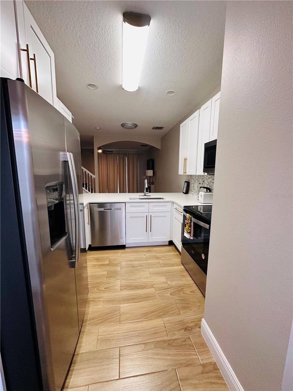 Photo of 1204 S Beach Circle, Kissimmee, FL 34746 (MLS # S5135911)