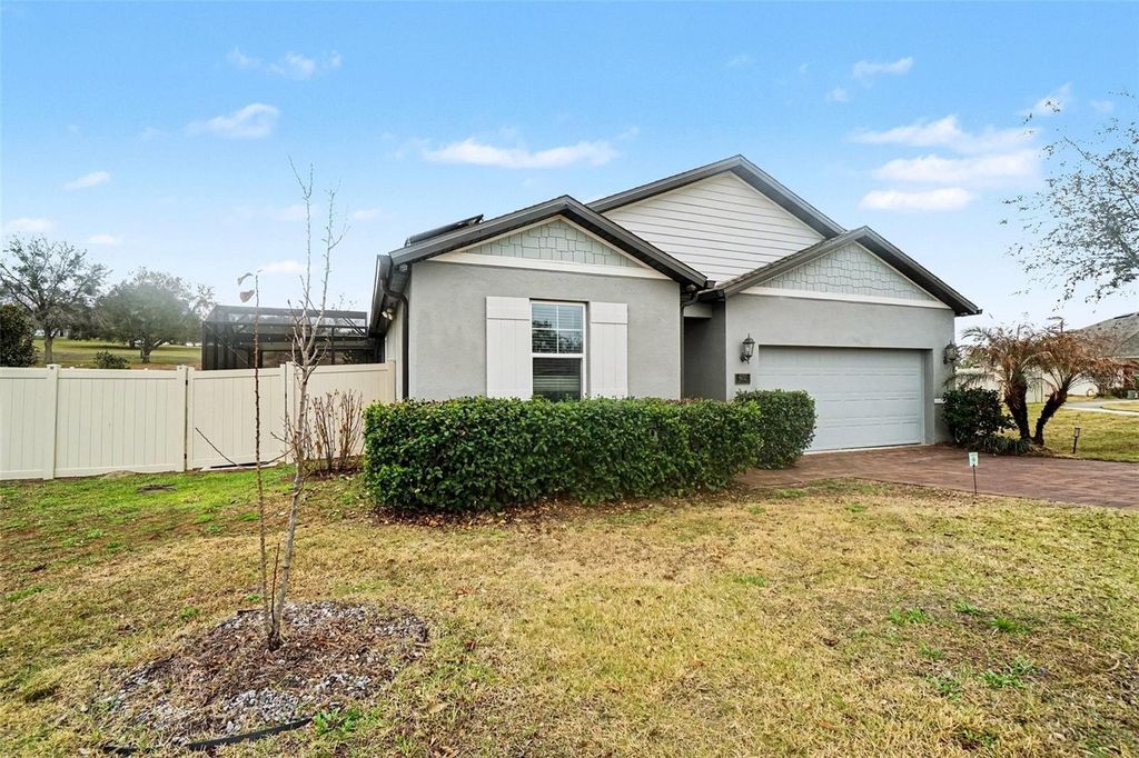 Photo of 602 Napoli Way, Howey In The Hills, FL 34737 (MLS # O6387624)