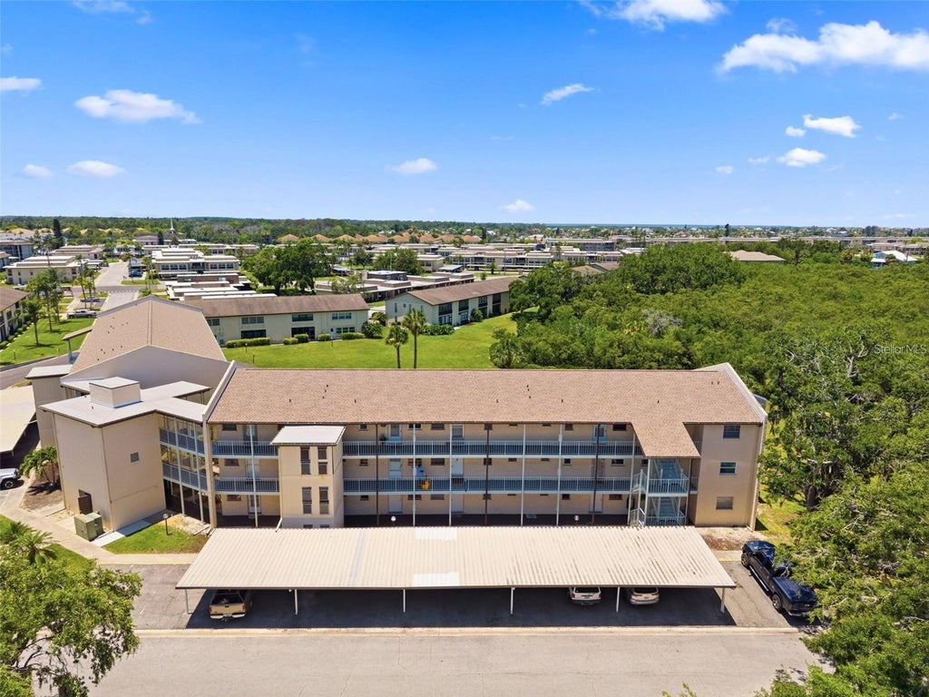 Photo of 5245 Amulet Drive #207, New Port Richey, FL 34652 (MLS # W7889873)