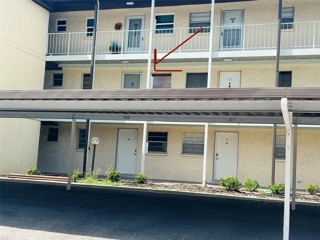 Photo of 5245 Amulet Drive #207, New Port Richey, FL 34652 (MLS # W7889873)
