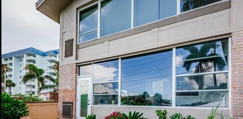 Photo of 2 Causeway Boulevard #101, Dunedin, FL 34698 (MLS # O6367424)