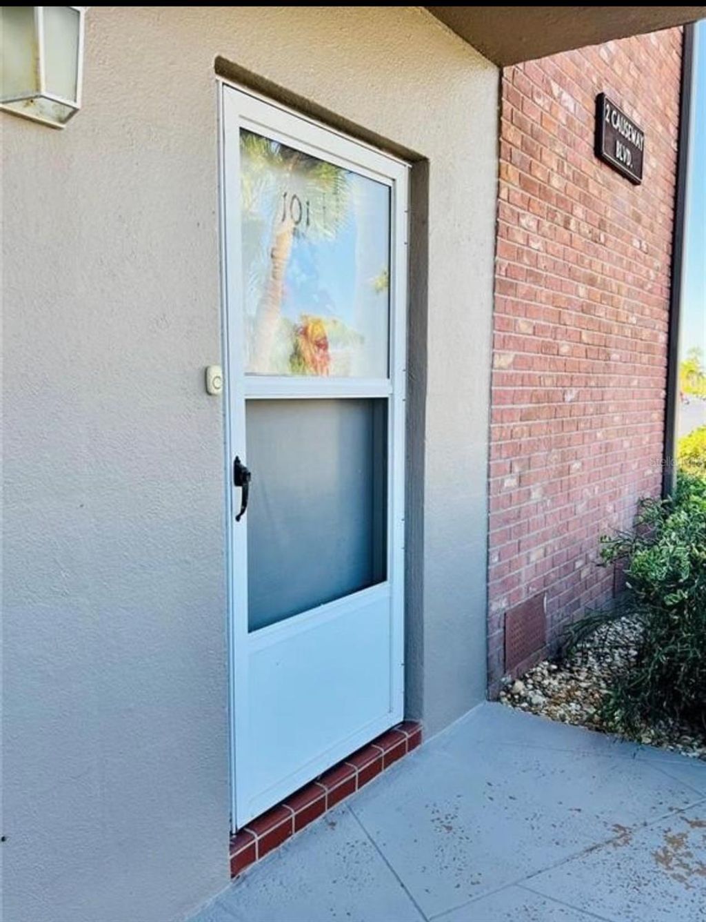 Photo of 2 Causeway Boulevard #101, Dunedin, FL 34698 (MLS # O6367424)