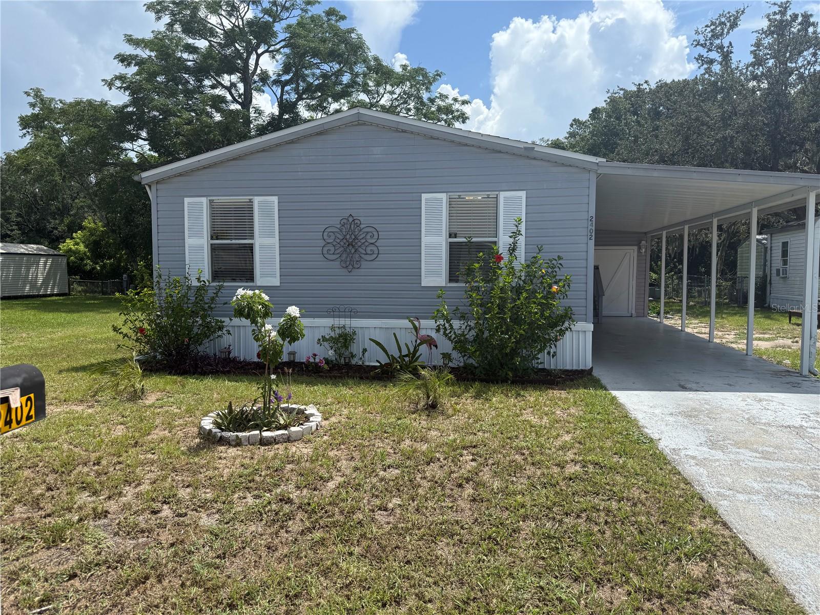Beautiful 3 Bedroom Double-Wide in 55+ Community – You Own the Land! Golf Cart Friendly. Move-In Ready.
Welcome to this beautifully updated double-wide manufactured home located in a vibrant 55+ community offering a variety of activities at the clubhouse. No lot rent – you own the land, and this property includes 1.5 lots, giving you extra space and value. NO FLOOD ZONE.
Step inside to find cathedral ceilings, a split bedroom floor plan.
Featuring 3 spacious bedrooms and 2 full bathrooms, this home boasts a huge master suite with a large, updated bathroom and convenient indoor laundry with washer and dryer included. The kitchen comes with a new refrigerator and newer oven/range, and the entire home has new plumbing throughout for added peace of mind.
Additional updates include:
New plumbing throughout
Fresh interior paint
New vinyl plank flooring
New vanities in both bathrooms
New skirting
New Refrigerator and newer oven/range
Indoor laundry with stackable washer and dryer included
With a low HOA of just $200 annually, MUST have HOA approval. Confirm pet restrictions. 2 pets 25lbs or less. Clubhouse has activities every week, book club, bingo, dances etc. This community offers affordable living just minutes from Historic downtown New Port Richey and the famous Tarpon Springs – the sponge capital of the world! Close to Tampa International Airport
Don’t miss this move-in ready gem in a highly sought-after area. Schedule your private tour today!