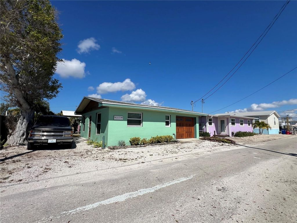 Photo of 2650 Coco Plum Drive, Matlacha, FL 33993 (MLS # OM718450)