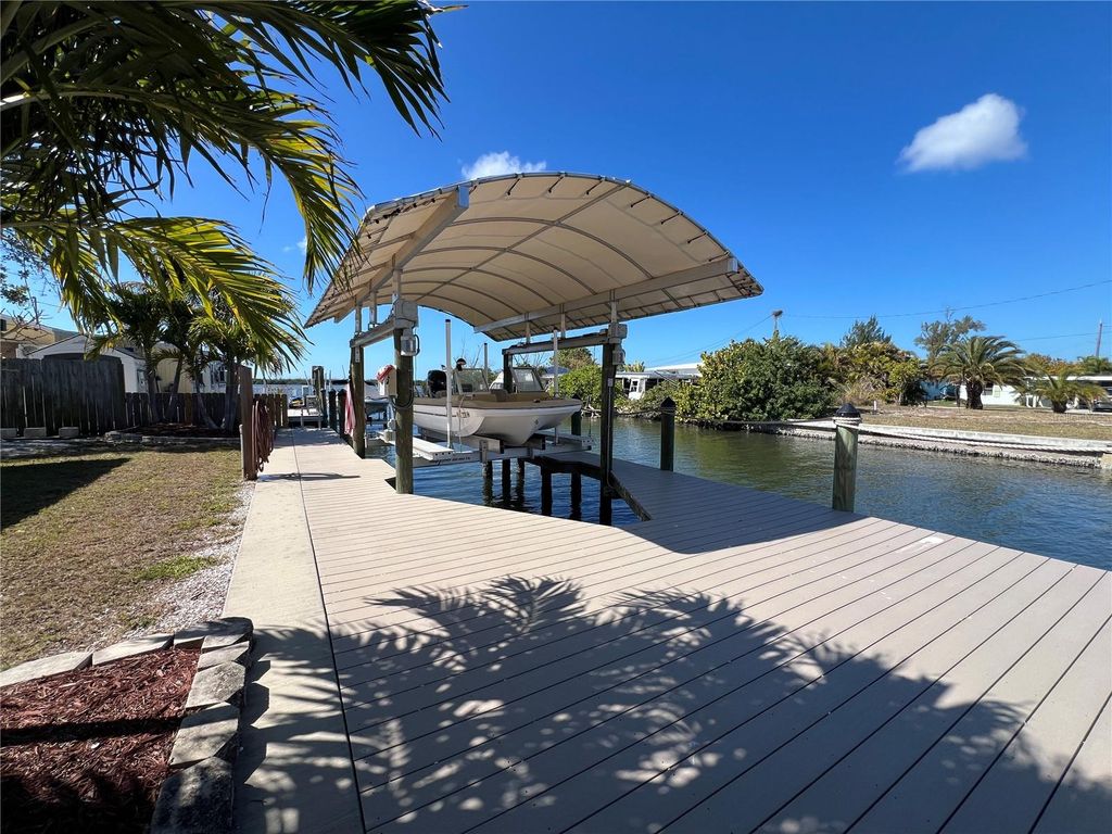 Photo of 2650 Coco Plum Drive, Matlacha, FL 33993 (MLS # OM718450)