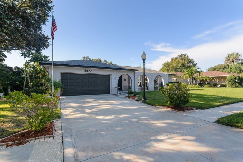 Photo of 2977 Ambleglen Court, Clearwater, FL 33761 (MLS # TB8558594)