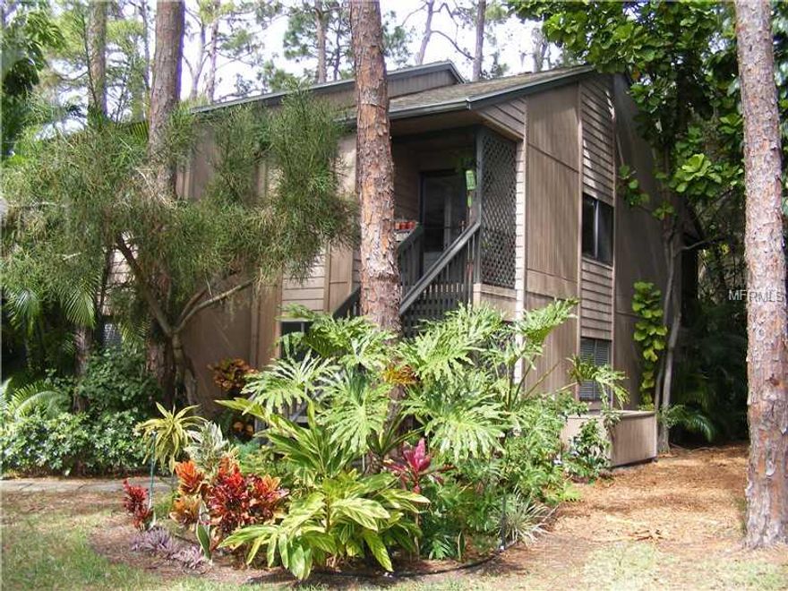 This is a superb 1 bed/1 bath second floor end unit condo with lots of natural light.  Pride of ownership beams brightly here --with cathedral ceilings, eat in kitchen and very well maintained throughout.   Note the lanai that affords extra living space for friends and family and boasts a fabulous private preserve view.   Amenities included in this community that was just rated Best Condominium of 2012 include 24 hour gated security w/ guard, 6 heated pools, 3 clubhouses, 4 lighted tennis courts, shuffleboard, basketball, dog walk, 87 boat slip harbor, 6 heated swimming pools, 4 tennis courts and 5 miles of walking trails and boardwalks.  This pet friendly resort lifestyle with art studios, social clubs, and exercise classes are just a few of the activities to take part in...