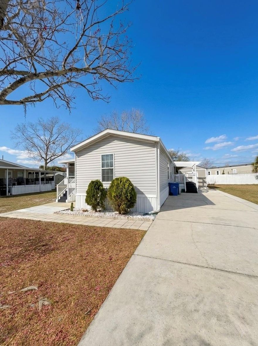 Discover true pride of ownership in this beautifully maintained home in DeLand! This 2-bedroom, 2-bathroom residence has been kept in pristine condition, offering a seamless "turn-key" experience. You will love the gorgeous flooring replaced just over two years ago, providing a modern and durable foundation throughout the living spaces.

Enjoy the ultimate freedom with NO HOA and NO CDD fees! Situated on its own land with Fee Simple ownership (No Lot Rent!), this property offers incredible value and privacy. The exterior features a spacious and well-maintained storage shed on the side of the home—perfect for a workshop, hobby space, or extra storage.

With an open layout filled with natural light, this home reflects the meticulous care it has received over the years. Located in a quiet area with no age restrictions, you are just minutes from the charm of historic Downtown DeLand. Don't miss this rare find—well-loved, updated, and ready for its next owner!