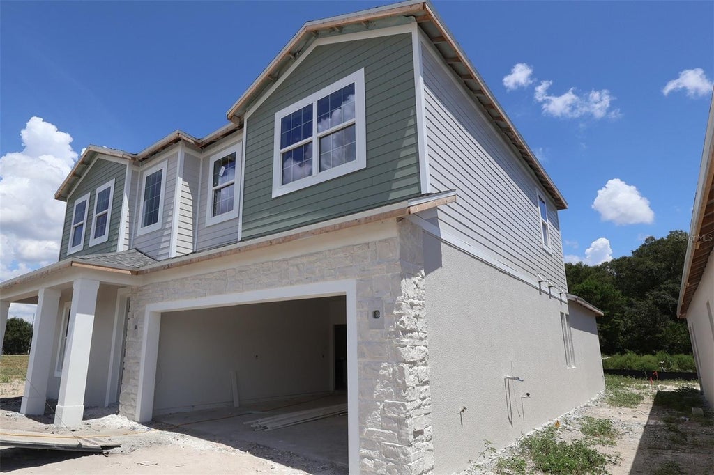 Photo of 2915 Sweetgrass Lane, Zellwood, FL 32798 (MLS # O6438565)