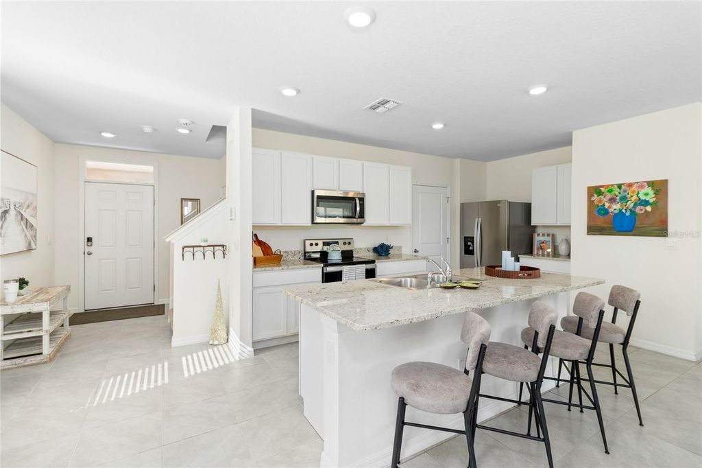 Photo of 5484 Warrington Town Path, Wesley Chapel, FL 33545 (MLS # TB8324008)