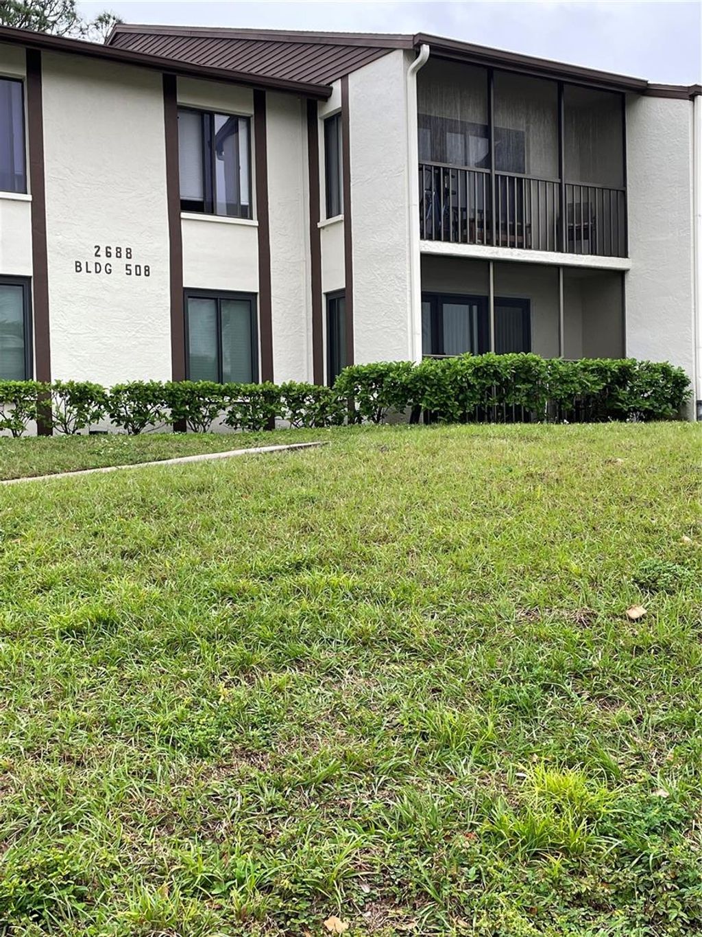 Photo of 2688 Pine Ridge Way N #D2, Palm Harbor, FL 34684 (MLS # W7884458)