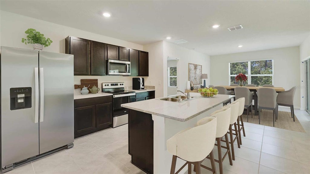 Photo of 4644 Connection Road, Wildwood, FL 34785 (MLS # OM727055)