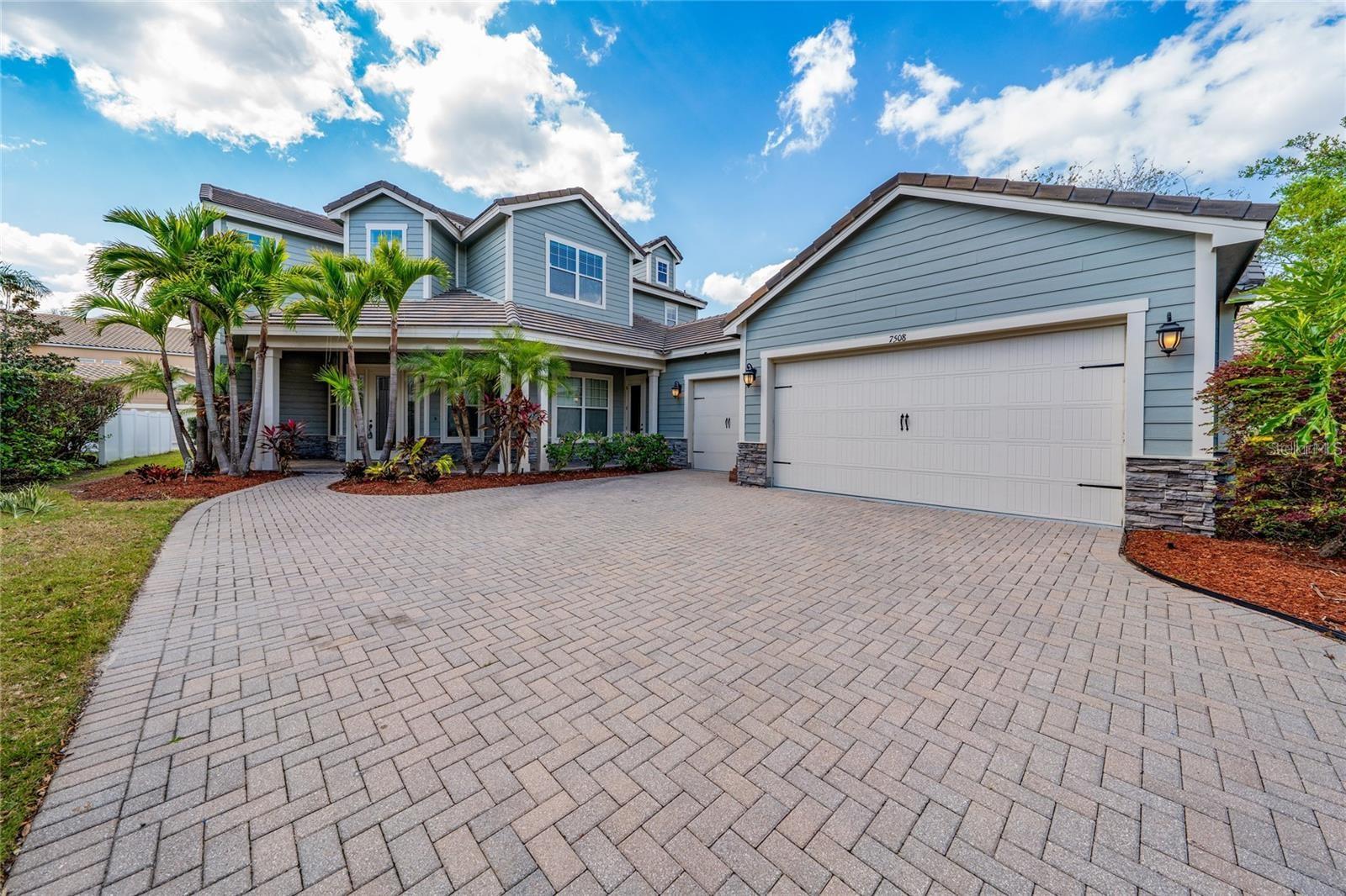 Don't miss this custom-built 4-bedroom, 3.5-bath Windermere Pool Home – beautifully updated and move-in ready! Conveniently located near theme parks, shopping, and top-rated schools, this stunning property offers a perfect blend of style, comfort, and practicality. Volume ceilings tower above the foyer and home office, while the gourmet kitchen features granite countertops, stainless steel appliances, a double built-in oven, a propane cooktop, and a butler's pantry. Additional upgraded features include: The interior of the house has been freshly painted, the first-floor flooring has been upgraded to vinyl, and new landscaping has been done around the property 18" travertine tile. Crown molding throughout. 10' ceilings. Propane fireplace. Granite bathroom vanities. Oversized 3-car garage with a workshop area. The master suite boasts two walk-in closets, dual vanities, a walk-in shower, and a separate soaking tub. Formal dining and a versatile office/den are located on the first floor, adding to the home's functionality. Outside, the beautifully landscaped yard and exquisite pool area provide the perfect setting for entertaining or relaxing. This home is situated in a resort-like community, featuring a sparkling pool, playground, tennis courts, park, fishing pier, and picturesque walking trails. This house is truly a showstopper, ready for immediate occupancy! Schedule your appointment today to see all the elegant details this home has to offer. Don’t wait! Apply today!!!!!