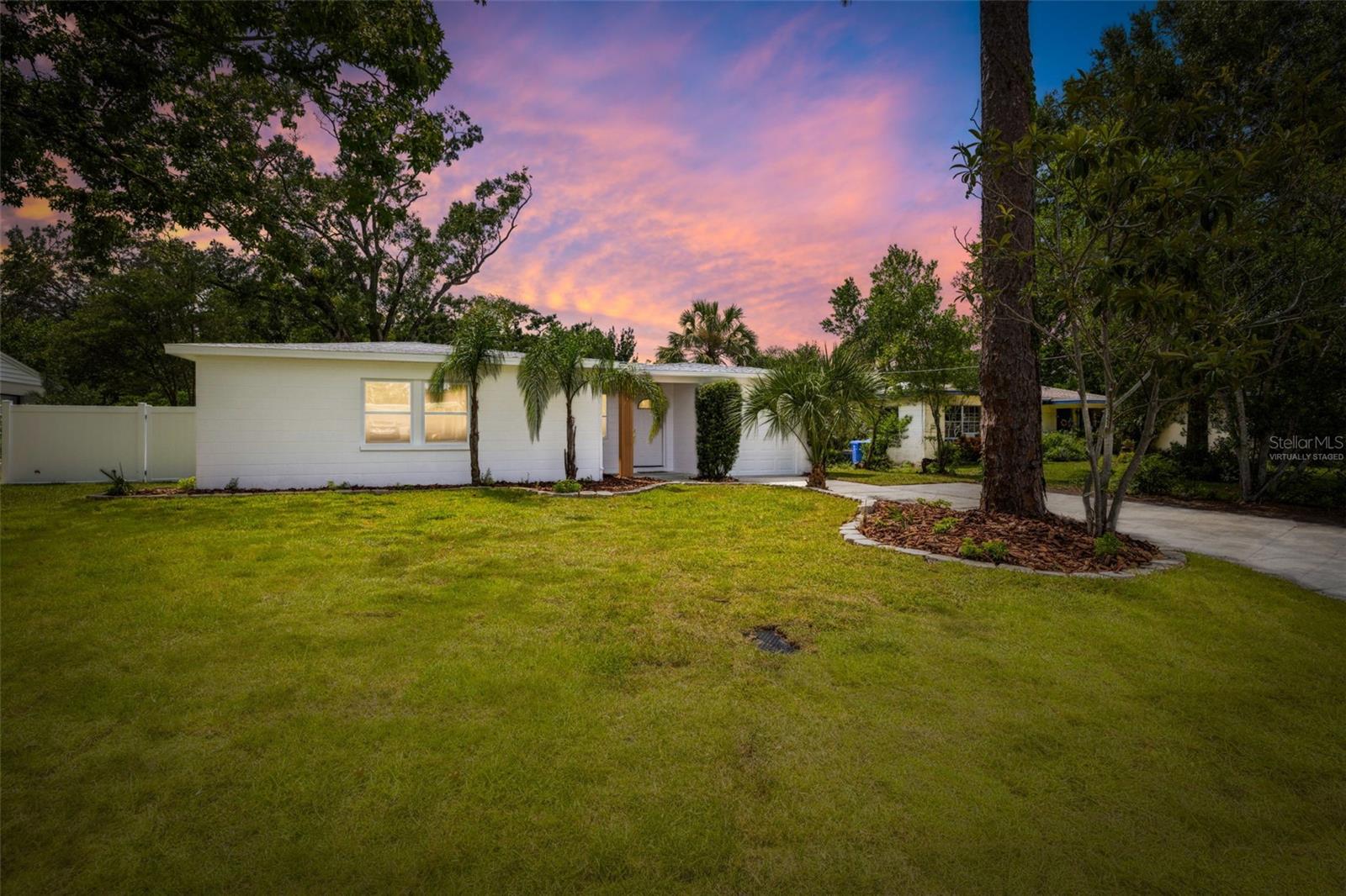One or more photo(s) has been virtually staged. Step into this beautifully updated 4-bedroom, 3- full bath home that perfectly blends comfort, style, and an unbeatable location. Situated in the highly desirable Forest Hills neighborhood, this diamond in the rough is just a short walk to the Babe Zaharias Golf Course, where golf lovers can enjoy the Pro Shop, Clubhouse Restaurant, and a variety of local community events. The open floor plan is filled with natural light and features brand-new luxury vinyl flooring, fresh paint inside and out, and a functional kitchen featuring new appliances, a pantry area, and plenty of storage. The spacious primary suite offers a large walk-in closet, and the thoughtful layout makes this home ideal for both living and entertaining. Enjoy peace of mind with a brand-new permitted roof (2025) along with a newer electrical panel, HVAC system with a smart Google Nest thermostat, water heater, and windows. Best of all, this property is located in an X flood zone, does not require flood insurance, and has NO HOA, giving you complete freedom and fewer worries. Outside, you’ll find lush landscaping and a fully fenced backyard that offers exceptional privacy for your pets, or simply relaxing outdoors, while a smart wireless video camera system adds extra security. Located just 15 minutes from Downtown Tampa and 20 minutes from Tampa International Airport, this home offers quick access to city amenities and major travel routes, making it a fantastic choice for both homeowners and investors. With so many upgrades and an unbeatable location, this home truly checks all the boxes, so make your appointment today to tour this beauty in person and experience all it has to present!